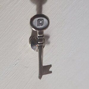 Planned Parenthood Skeleton Key Lapel Pin Tie Tack Brooch